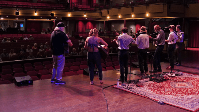 the Appalachian Ensemble playing on stage facing the audience