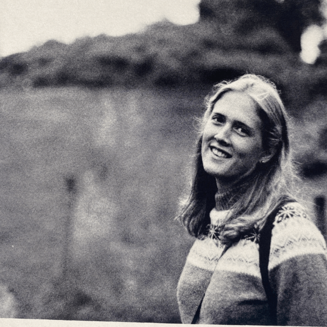 a black and white photo of a young woman