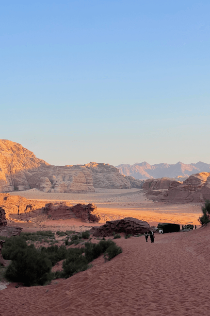 a desert scene at sunset