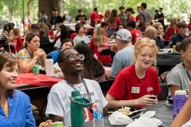 A group of new students at the orientation picnic