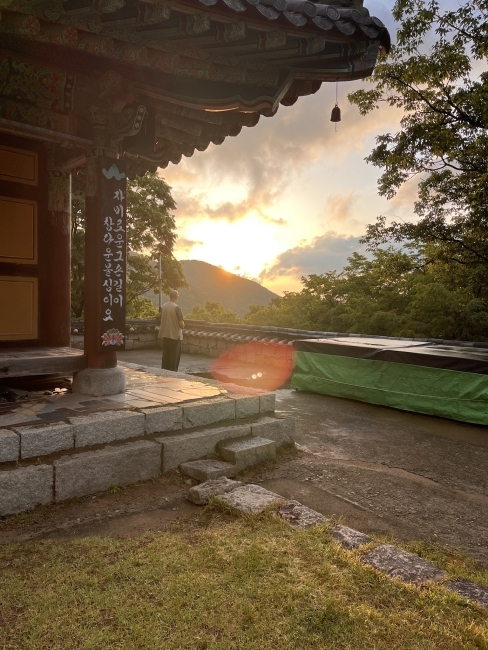 a Buddhist temple at sunrise