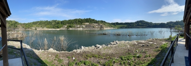 a panoramic view of a lake that was formerly a mine