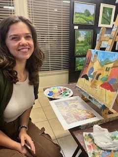 Art Dialogue student at easel