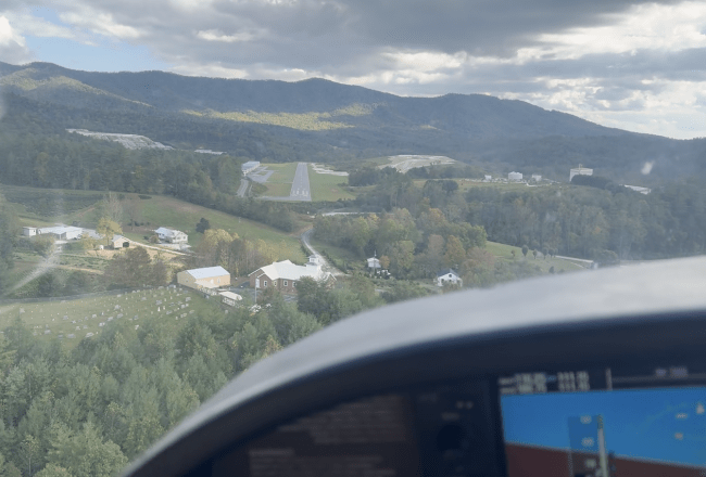 an aerial view of rural country seen from plane