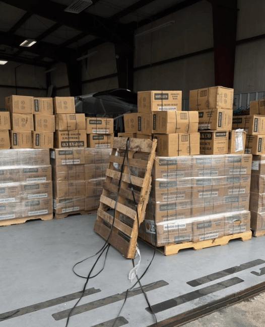 crates of cardboard boxes on a loading dock