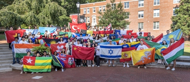 International student group holding flags