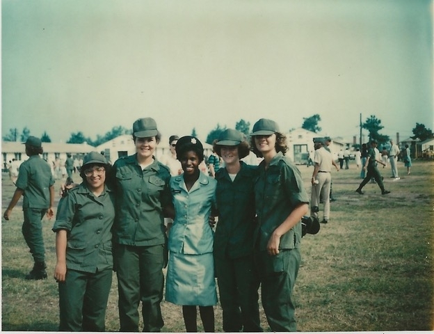 a group of young people in military uniforms