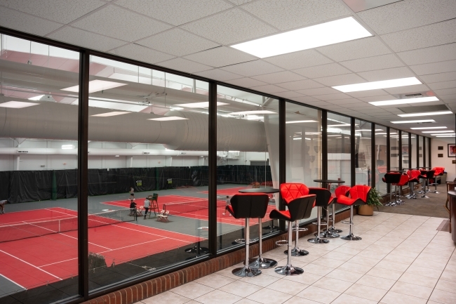 an indoor tennis practice facility