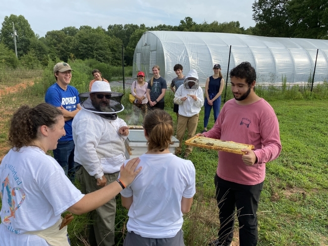  Sustainability Students Bee Keeping Status message on farm