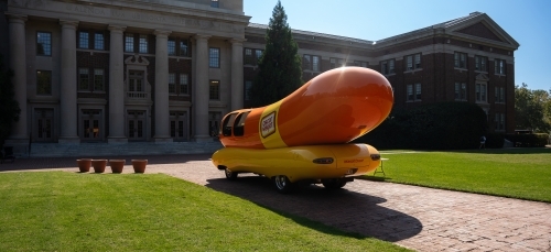 Oscar Mayer Wienermobile parked outside of Chambers building