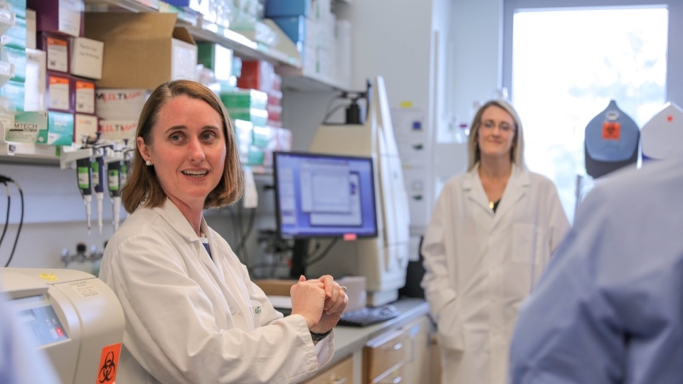 Sallie Permar with colleague in lab