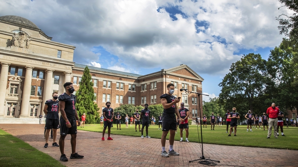 Social Justice Event - Football Team on the Green