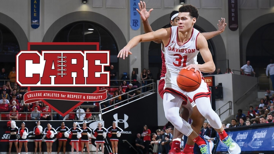 Kellan Grady Dribbles Ball During Basketball Game, CARE logo is overlaid