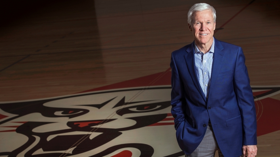 Coach McKillop portrait on basketball court