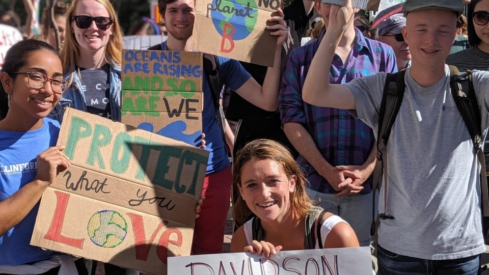 Students holding signs at climate strike