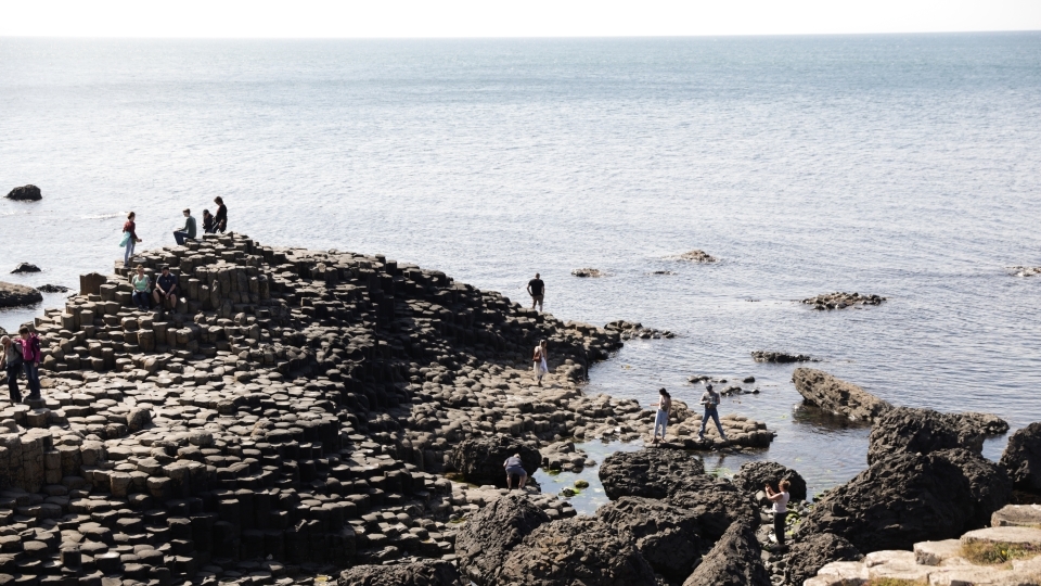 an ocean view of rocky cliffs