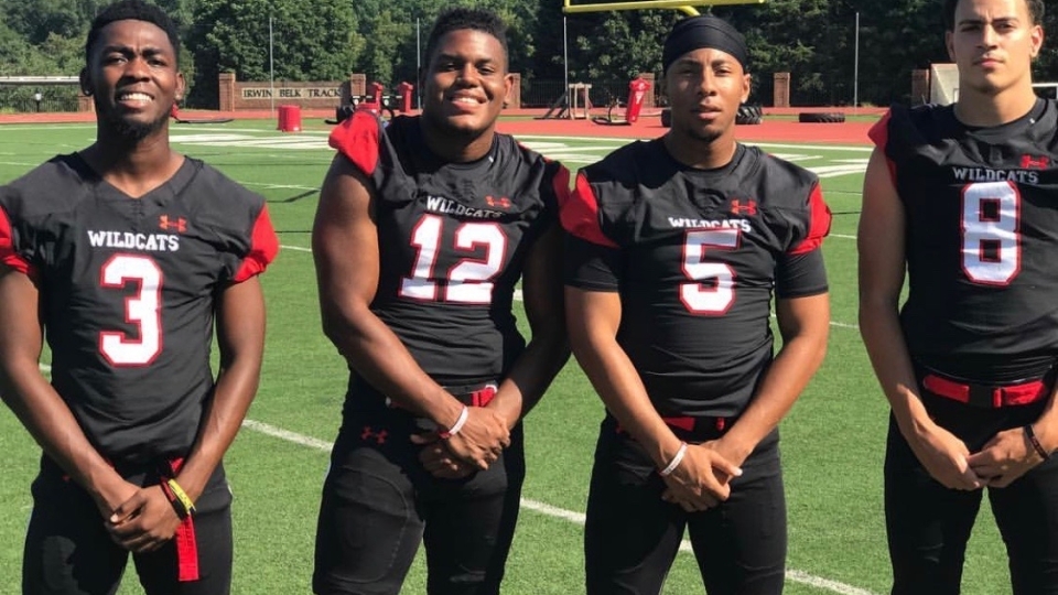 Members of the football team with Jonathan Sheperd-Smith ’18 (#12)