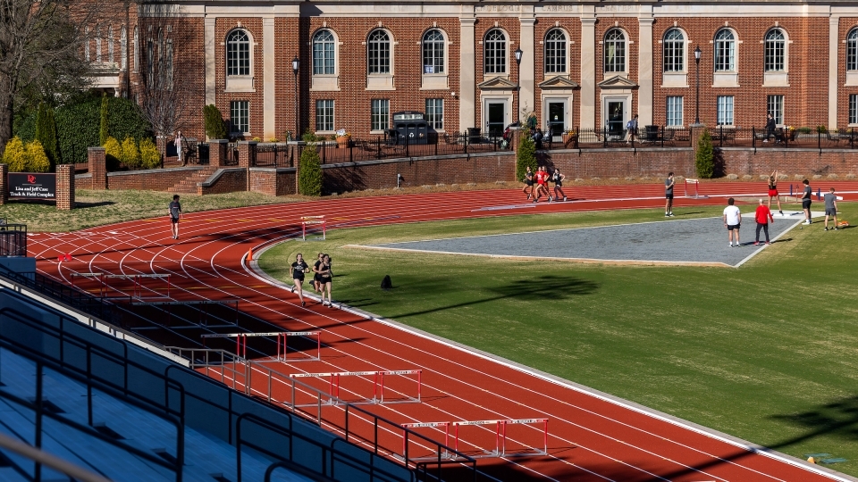 Lisa and Jeff Case Track & Field Complex view from the stands with student union in the background