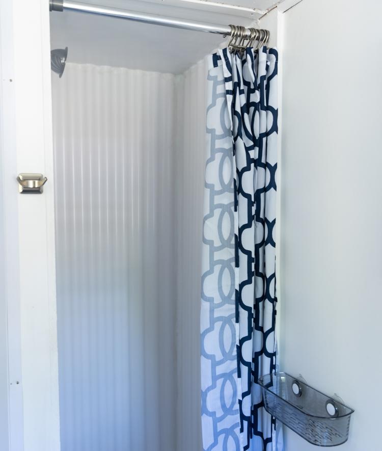 Shower with patterned curtain