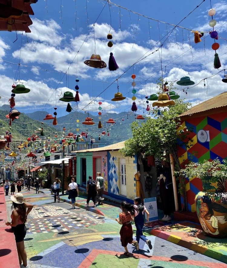a colorful street in a Guatemalan village