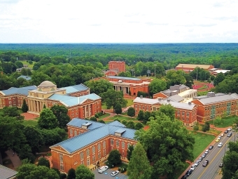 Aerial of Davidson College campus showing lots of campus buildings and trees