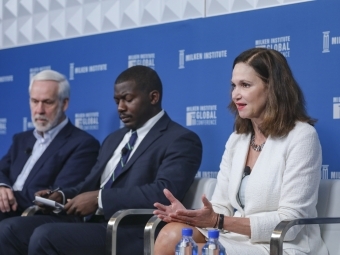 Carol Quillen and other leaders sit at panel