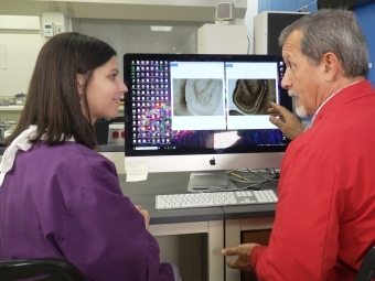 Katie Barlis and Prof. Julio Ramirez in the lab doing research