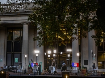 Library front with CNN monitors and recording crew and equipment