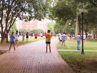 Group of students have socially distant gathering