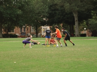 Students in Masks play Spike Ball