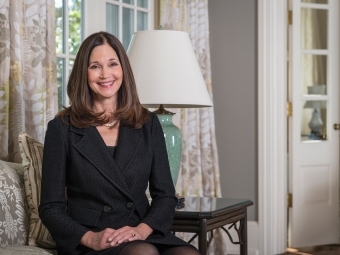 Carol Quillen sitting on a chair 