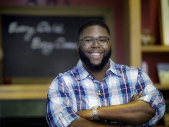 Tony jack in front of C]chalkboard