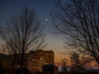 Sunset with Moon and Stars Over Campus