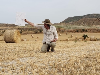 Michael Toumazou working in the field