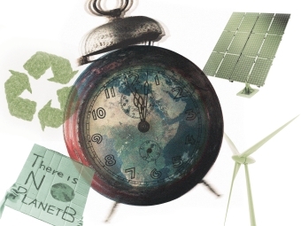 Collage of ringing alarm clock with Earth superimposed on the face encircled by a solar panel, a windmill, an recycling symbol and a sign saying "There is no planet B."