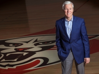 Coach McKillop portrait on basketball court