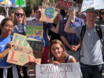 Students holding signs at climate strike