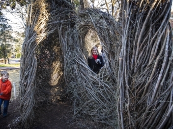 Eileen Keeley enjoying Common Ground sculpture