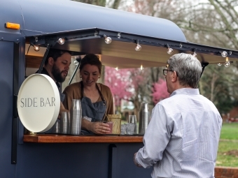 Random Acts of Kindness Day President Doug Hicks '90 stopped by the pop-up beverage station for a mid-day break.