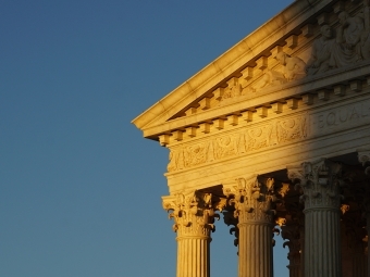 Shadow cast over the top of the US Supreme Courthouse