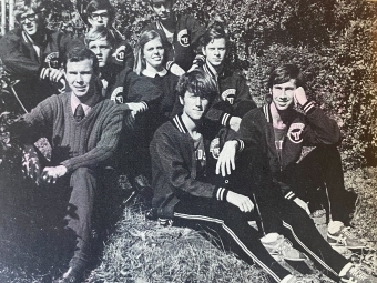 a group of cross country runners in a black and white 1970s photograph