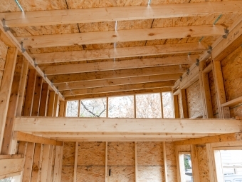 The unfinished interior loft of the tiny house