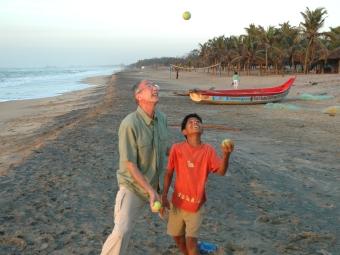 Bill Giduz Juggling with a boy at the beach