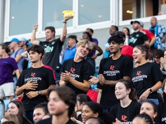 Happy students at the Charlotte Football Club