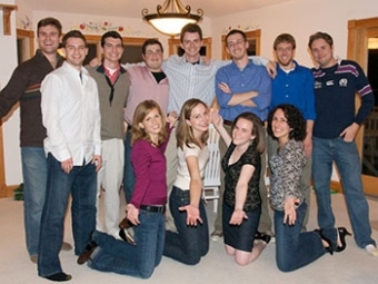 Anstrom (fourth from left, back row) with friends from the Class of 2004, including Murray and Legato, at the beach in 2009.