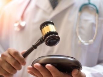 a doctor holding a gavel