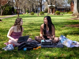 Students hanging out with laptops