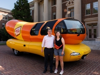 Schmitt with Doug Hicks in front of Wienermobile