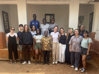 Group of Students gathering outside Davidson in Ghana Program