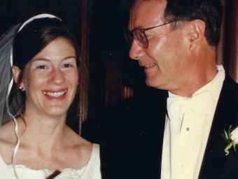 Elliot walks down the aisle with father Ross Smyth at her 1997 wedding to Andy Berndt